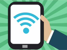 Mediendidaktisches Design Grafik mit einer Hand, die ein Tablet hält